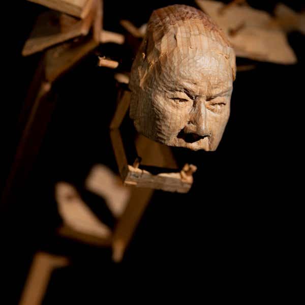 Wooden figure sculpture by Jamie Frost 