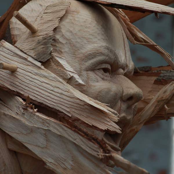 carved wooden figure by jamie frost