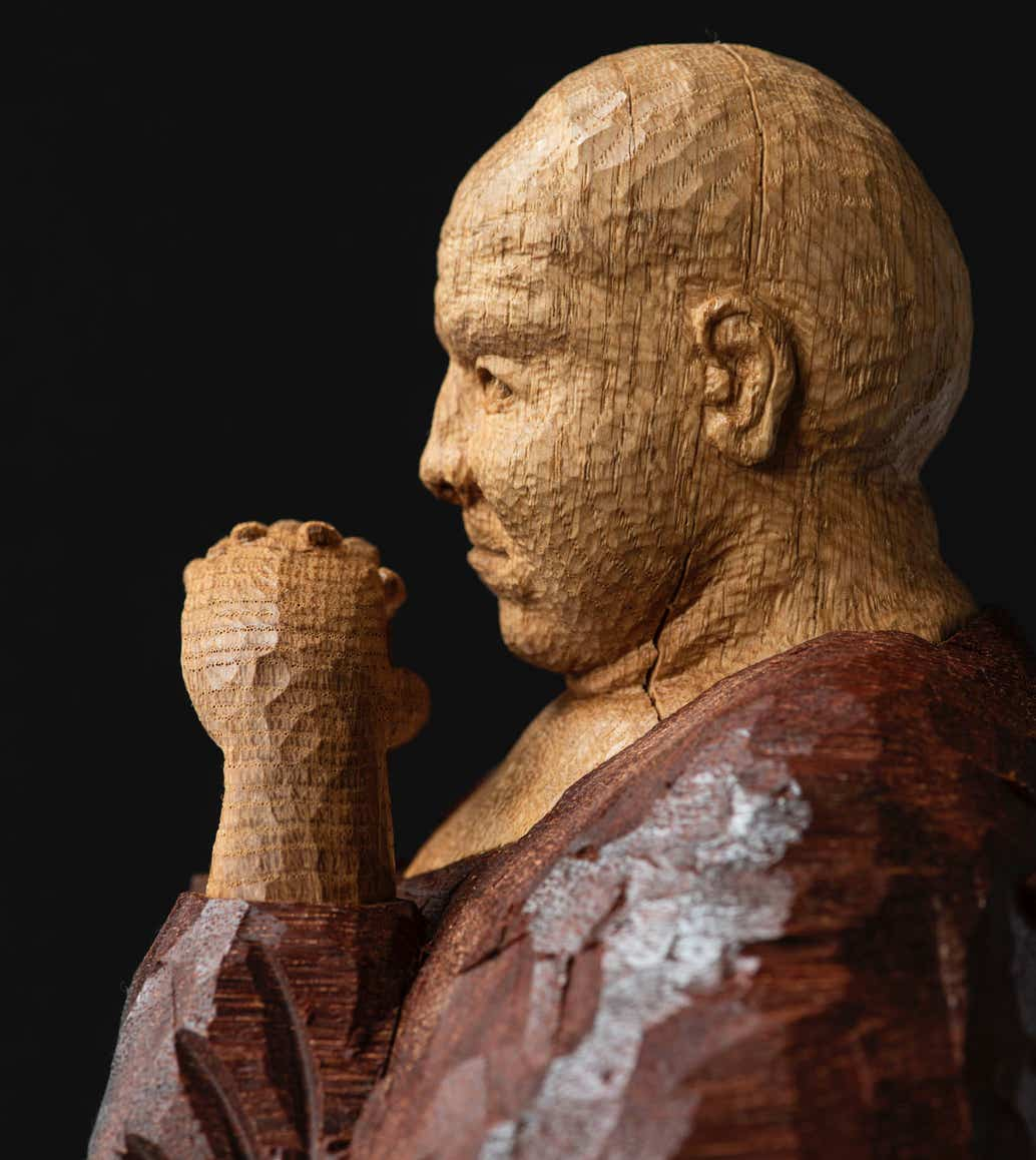 wooden figure sculpture by jamie frost