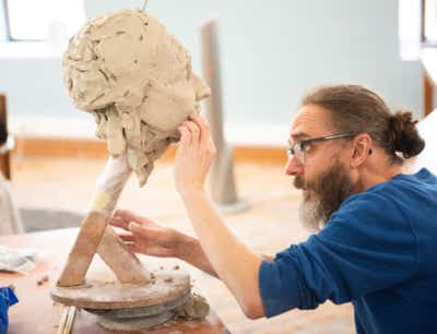 carving wood in sculpture class