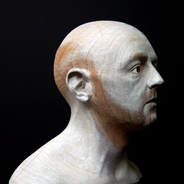 portrait sculpture in wood by jamie frost